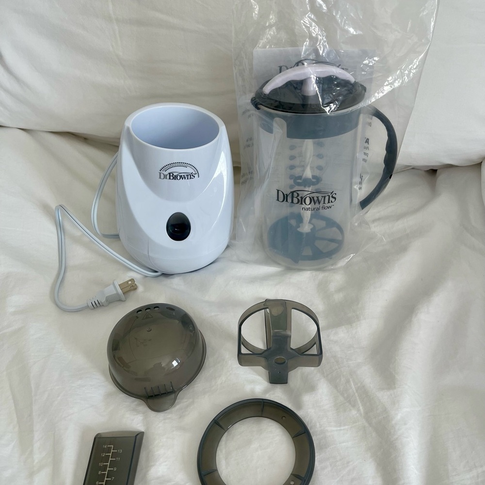 White and Gray Baby Bottle Warmer with Mixing Container and Gray Accessories